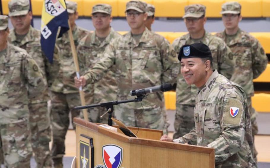 Col. Henry Brown addresses attendees as the 403rd Army Field Support Brigade’s new commander during the Powerhouse Brigade’s change of command ceremony at Kelly Fitness Center on Camp Walker, South Korea, July 7. (Photo Credit: Galen Putnam)