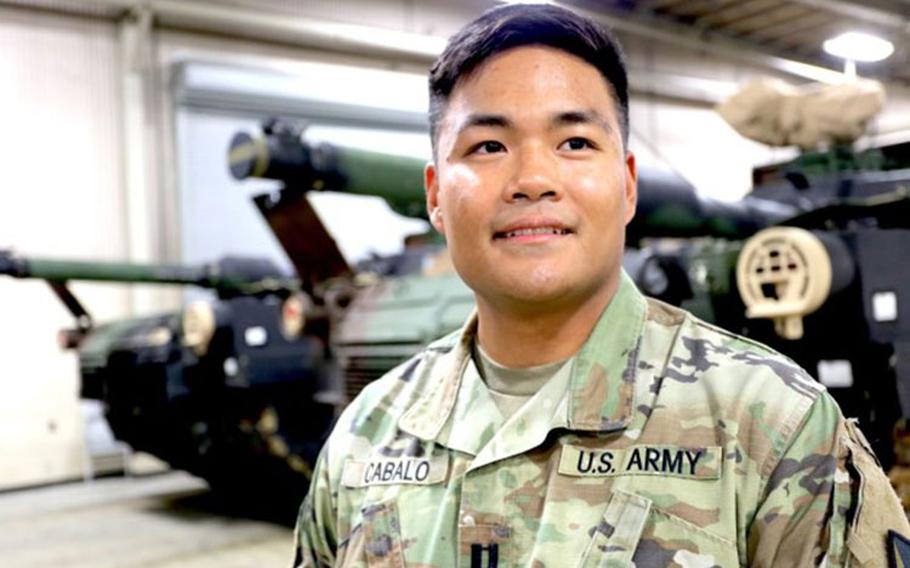 Capt. Joseph Cabalo, operations officer, Army Field Support Battalion-Northeast Asia, discusses Army Prepositioned Stocks-4 operations at Camp Carroll, Republic of Korea (Photo Credit: Staff Sgt. Joseph Tolliver, 19th Expeditionary Sustainment Command Public Affairs)