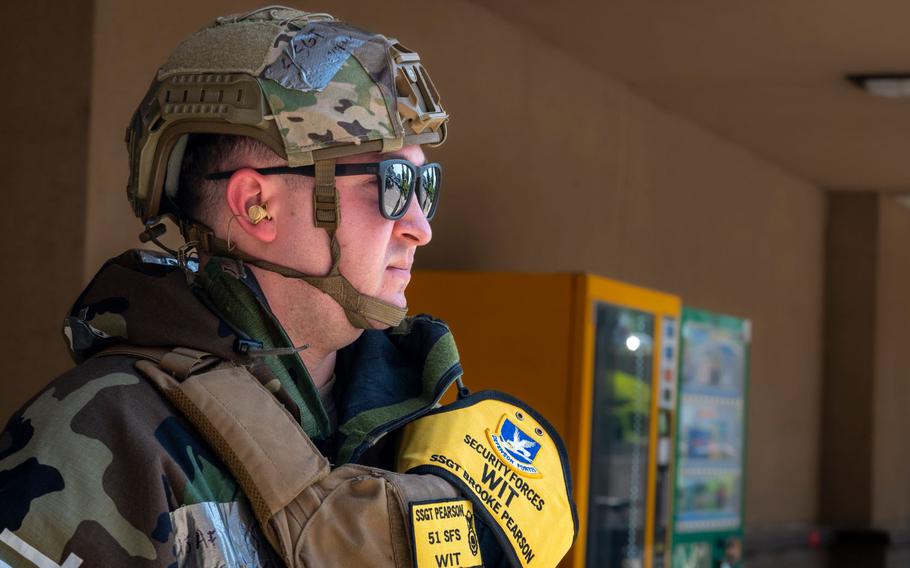 U.S. Air Force Staff Sgt. Brooke Pearson, 51st Security Forces Squadron wing inspection team member, evaluates personnel amid a simulated attack scenario during Beverly Herd 24-1 at Osan Air Base, Republic of Korea, May 14, 2024. 