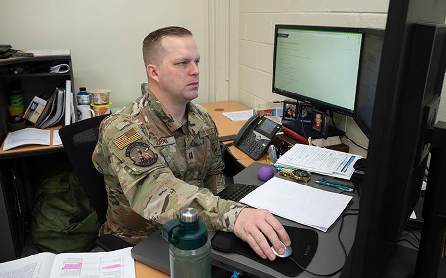 Capt. Robert Cornia, 8th Fighter Wing inspector general of complaints resolution (IGQ) reviews information on his computer at Kunsan Air Base, Republic of Korea, April 20, 2023. Some of the many issues that an IGQ can assist with is order delays or correcting date of estimated return to overseas but if it came to matters out of an IGQ area of expertise they will direct the Airman to the right subject matter expert. (U.S. Air Force photo by Senior Airman Akeem K. Campbell)