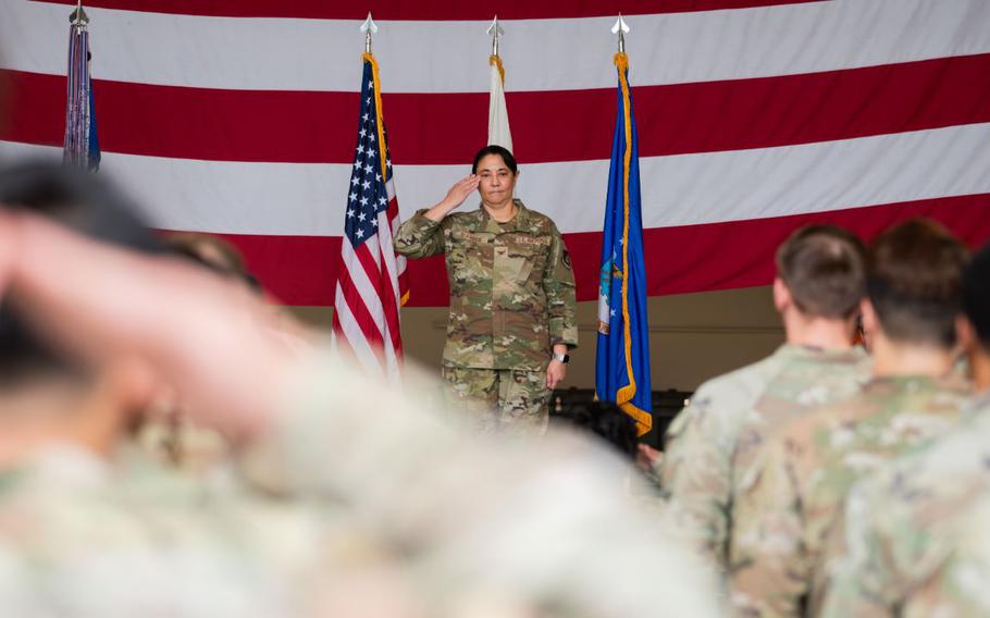 U.S. Air Force Col. Amanda Siangco, incoming 51st Medical Group commander, renders her first salute during a Change of Command ceremony at Osan Air Base, Republic of Korea.