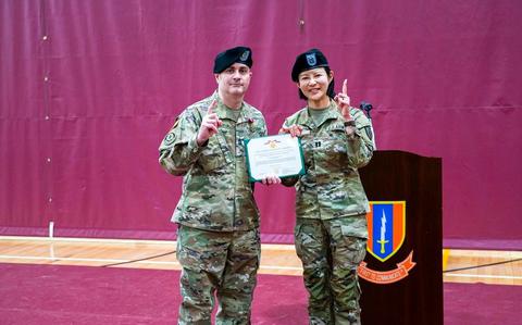 Photo Of U.S. Army 1st Sgt. Matthew Barnhart and U.S. Army Capt. Ah Cho Commander of Headquarters and Headquarters Company, 1st Signal Brigade, at the Change of Responsibility Ceremony.