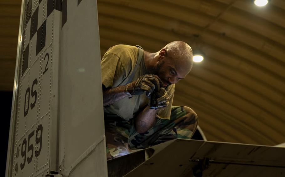 U.S. Air Force Staff Sgt. Trevion Bass, 25th Fighter Generation Squadron dedicated crew chief, inspects the tail wing on an A-10 Thunderbolt II during Ulchi Freedom Shield 24, at Osan Air Base, Republic of Korea, Aug. 22, 2024.