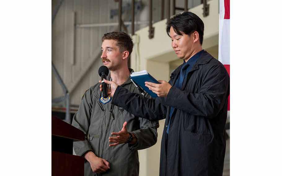 U.S. Air Force Capt. Alex Drummond, 36th Fighter Squadron F-16 Fighting Falcon pilot, shares the 36th FS aviation history with the assistance of Kim, Dae-Hwan, 51st Fighter Wing public affairs specialist and interpreter, during Pilot’s Day at Osan Air Base, Republic of Korea, July 17, 2024.