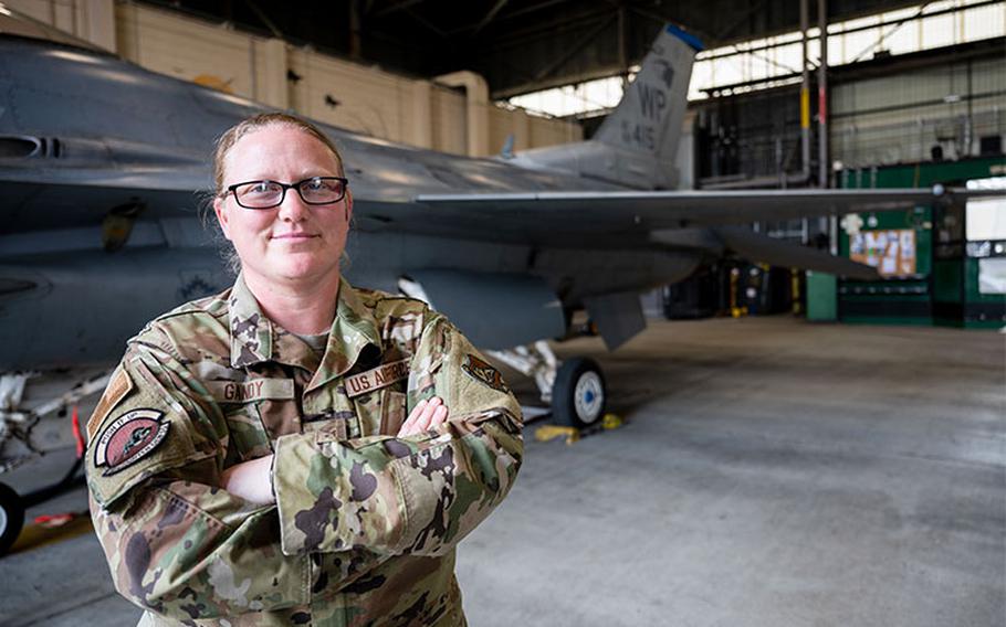 Tech. Sgt. Corrin Gandy, 35th Fighter Generation Squadron inspection flight chief, stands in front of an F-16 Fighting Falcon at Kunsan Air Base, Republic of Korea, May 11, 2023. Gandy was recognized as Pride of the Pack, a base initiative that rewards Airmen that go above and beyond in their work center. (U.S. Air Force photo by Senior Airman Karla Parra)