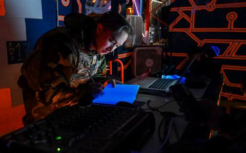 Photo Of U.S. Air Force Staff Sgt. Henry Kern, 8th Communications Squadron data operations journeyman, takes notes during Beverly Sentinel 25-1 at Kunsan Air Base, Republic of Korea.