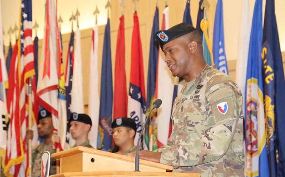 Command Sgt. Maj. Cedrick Harvey provides remarks during his assumption of responsibility ceremony at Soldiers Memorial Chapel on Camp Walker, South Korea, July 14.