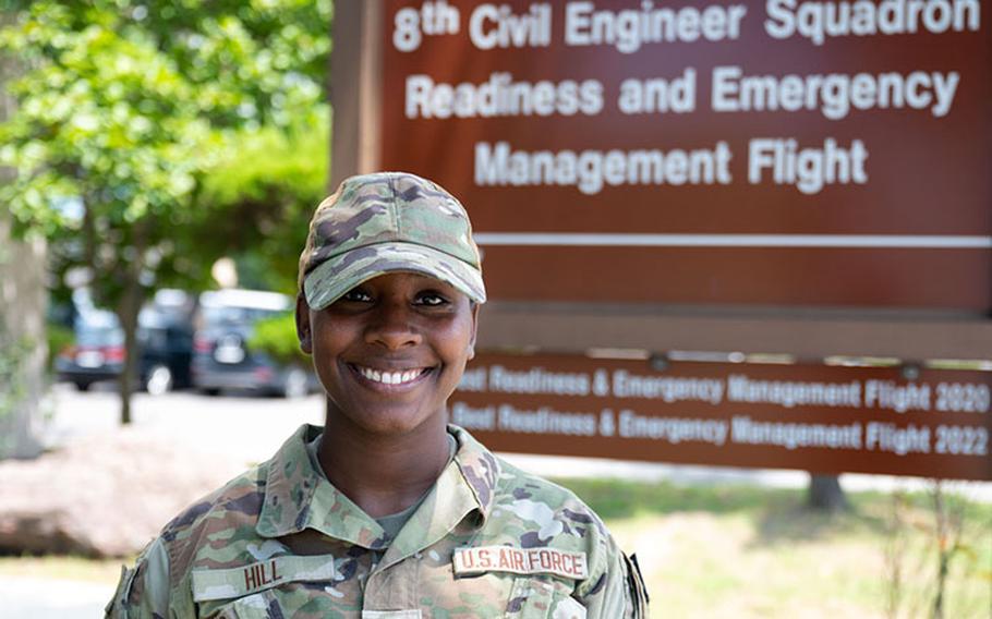 Airman 1st Class Victoria Hill, 8th Civil Engineer Squadron emergency management apprentice, poses for a photo after winning the 8th Fighter Wing’s Pride of the Pack award at Kunsan Air Base, Republic of Korea, Aug. 3, 2023. Hill was chosen for leveraging her leadership skills while managing the wing’s joint disaster response force and training new members of the Wolf Pack on emergency response and recovery procedures. (U.S. Air Force photo by 1st Lt. Brandon DeBlanc)