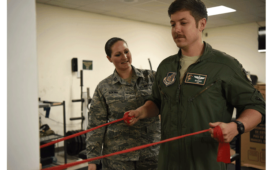 U.S. Air Force Capt. Will Piepenbring, an A-10 Thunderbolt II pilot with the 25th Fighter Squadron, performs a postural exercise at Osan Air Base, Republic of Korea, Feb. 13, 2019. The exercise focuses on working scapular muscles and shoulder blades. (U.S. Air Force photo by Staff Sgt. Sergio A. Gamboa)