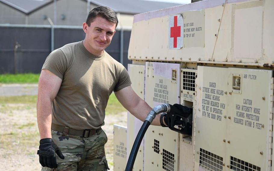 Senior Airman Alexander Page, 8th Healthcare Operations Squadron bioenvironmental equipment technician, refuels a generator providing power to the 8th Medical Group’s expeditionary medical support (EMEDS)+10 hospital at Kunsan Air Base, Republic of Korea.