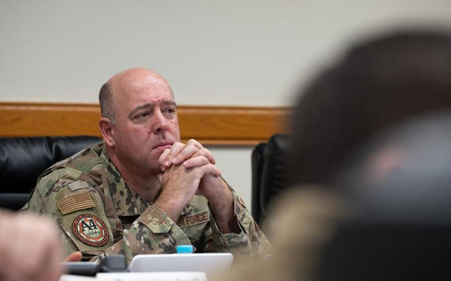 Col. Patrick Miller, Pacific Air Forces logistics, engineering and force protection director, listens to a mission brief, at Kunsan Air Base, Republic of Korea, Feb. 28, 2023. Prior to circulating throughout the unit and visiting with Airmen, Miller learned about the Wing’s current capabilities and innovating processes being implemented to further enhance mission productivity. (U.S. Air Force photo by Staff Sgt. Sadie Colbert)