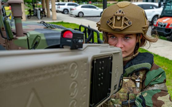 Senior Airman Cheyanne Parsons, 8th Security Forces Squadron counter small unmanned aerial system instructor, calibrates a Dronebuster Block 4 utilized to disrupt and deny enemy sUAS threats access to areas during exercise Beverly Sentinel 25-3