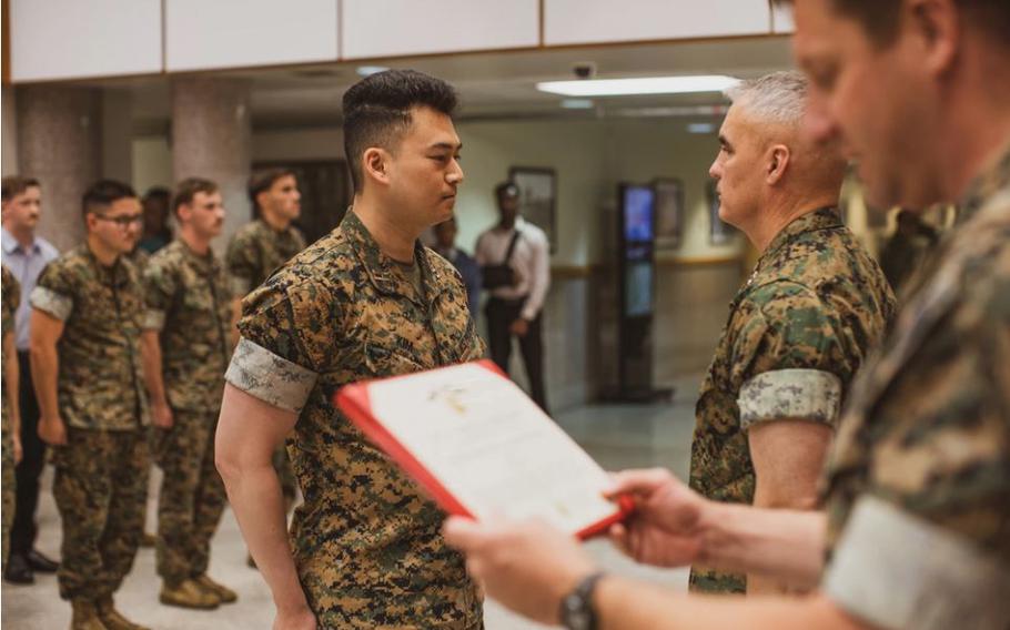 U.S. Marine Corps Capt. Rod Kim, a deputy current operations officer, with U.S. Marine Corps Forces, Korea, receives a Navy and Marine Corps Achievement Medal during an award ceremony on U.S. Army Garrison Humphreys, South Korea, May 16, 2024.