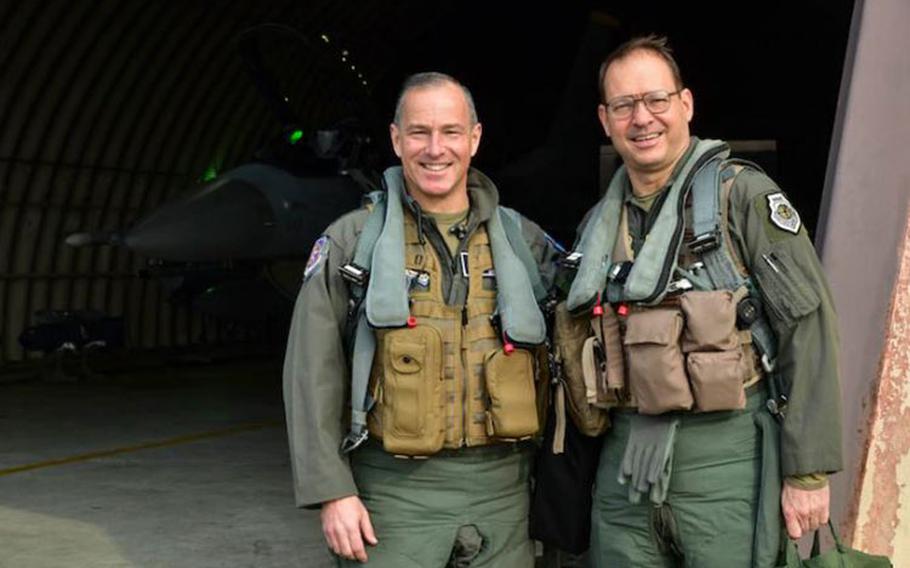 Lt. Gen. Scott Pleus, Seventh Air Force commander, and Maj. Gen. Stephen Williams, U.S. Forces Korea Chief of Staff, pose for a photo at Kunsan Air Base, Republic of Korea, Dec. 23, 2020. Pleus and Williams served at Kunsan, respectively, as the 8th Fighter Wing commander and vice commander in 2011 to 2012. (U.S. Air Force photo by Tech. Sgt. Kristin High)