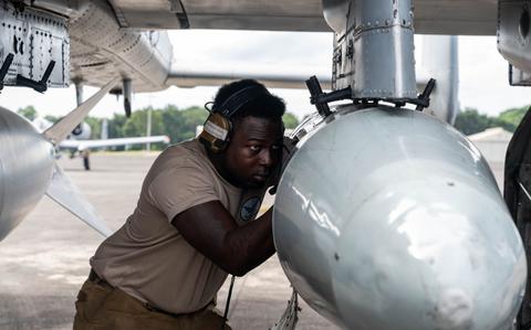 Photo Of U.S. Air Force Senior Airman Ke’von Heath, 25th Fighter Generation Squadron dedicated crew chief, performs a pre-flight check at Clark Air Base, Philippines, Dec. 14, 2024.