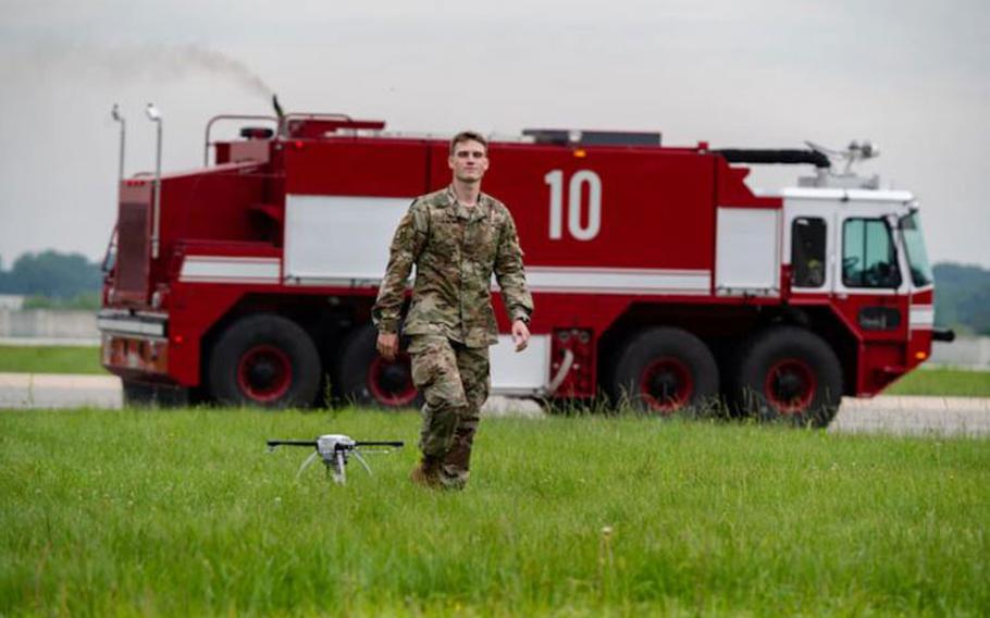 Staff Sgt. Nathan Powers, 51st Civil Engineer Squadron construction inspector technician, inspects small unmanned aircraft systems after landing at Osan Air Base, Republic of Korea, June 6, 2021. Airmen operate these aerial systems as part of their quarterly Rapid Airfield Damage Assessment System training. (U.S. Air Force photo by Tech. Sgt. Nicholas Alder)