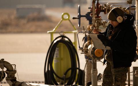 Photo Of Airman 1st Class Natasha Gonzalez, 8th Logistics Readiness Squadron fuels distribution apprentice reviews a checklist prior to refueling an F-16 Fighting Falcon at Kunsan Air Base, Republic of Korea, Feb. 7, 2024.