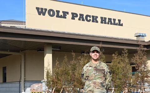 Photo Of Airman 1st Class Miguel Ramirez, 8th Force Support Squadron food service apprentice, stands outside the new dining facility at Kunsan Air Base, Republic of Korea, Dec. 11, 2024.