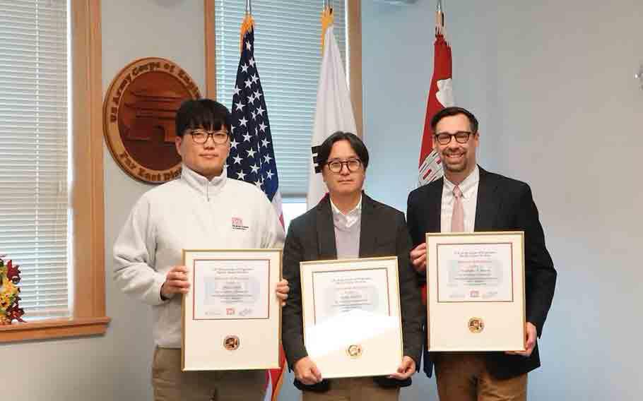 Sang Na, Civil Engineer, U.S. Army Corps of Engineers – Far East District, accepts Minjae “MJ” Park’s certificate on his behalf; while Seung Ji, Deputy Chief of Construction; and Christopher Carson, project manager, accepts their completion certifications at the USACE Leadership Development Program (ULDP) Level 3 graduation held Dec. 5, 2024, at Camp Humphreys, South Korea. ULDP’s aim is to cultivate leadership at every level within USACE to benefit the organizations and beyond.