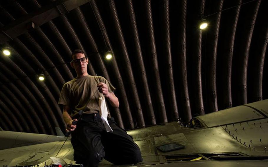 Staff Sgt. Armando Sutton, 36th Aircraft Maintenance Unit, F-16 Fighting Falcon dedicated crew chief, works on an F-16 at Osan Air Base, Republic of Korea, March 17, 2022. Sutton is one of three Airmen assigned to the 36th AMU who won the title of Crew Chief of the Year. The 36th has maintained the winning streak for 36 consecutive months. (U.S. Air Force photo by Senior Airman Allison Payne)