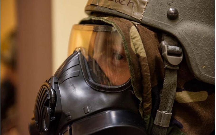 Tech. Sgt. Zach Steinkamp, 51st Civil Engineer Squadron assistant chief of training, rests after a scenario during a routine training event at Osan Air Base, Republic of Korea, September 13, 2021. The event consisted of 51st CES Airmen responding to a fire alarms, putting out the simulated fires and rescue. (U.S. Air Force photo by Staff Sgt. Douglas Lorance)