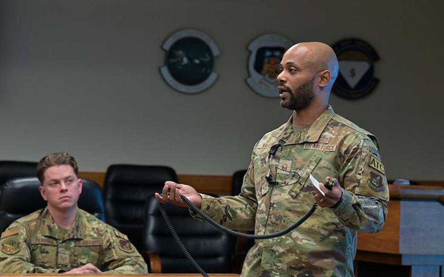 Master Sgt. Randall Vaughn, 8th Operations Squadron radar approach control system assistant chief controller, presents his innovative idea at a Wolfwerx event at Kunsan Air Base, Republic of Korea, Dec. 28, 2023. Vaughn's proposal for wireless air traffic control headsets was supported by the 8th Fighter Wing command and the funding process is underway to bring this technology to the 8th OSS. (U.S. Air Force Tech. Sgt. Emili Koonce)