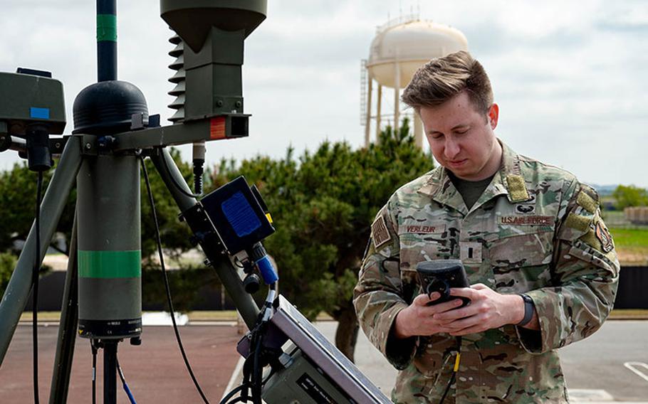 1st Lt. Keis Verleur, 8th Operations Support Squadron weather flight commander and weather parachutist, looks at data on a Tactical Meteorological Observing System at Kunsan Air Base, Republic of Korea, April 20, 2023. TMOS provides weather forecasters information on air speed, wind direction, temperature, humidity, cloud height and presents weather conditions such as rain, snow, fog, ice and lightning. (U.S. Air Force photo by Senior Airman Shannon Braaten)