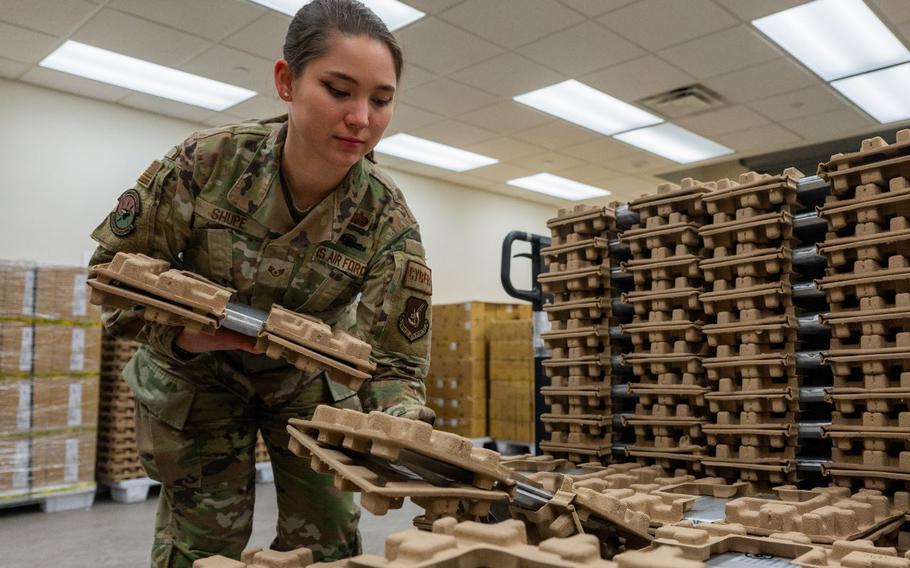 Staff Sgt. Samantha Shupe, 8th Communications Squadron client operations supervisor, collects laptops from the 8th CS storage room at Kunsan Air Base, Republic of Korea Jan. 17, 2024. Since Nov. the 8th CS has been deploying 17 workstations a day in support of the first tech refresh for Kunsan AB in six years.
