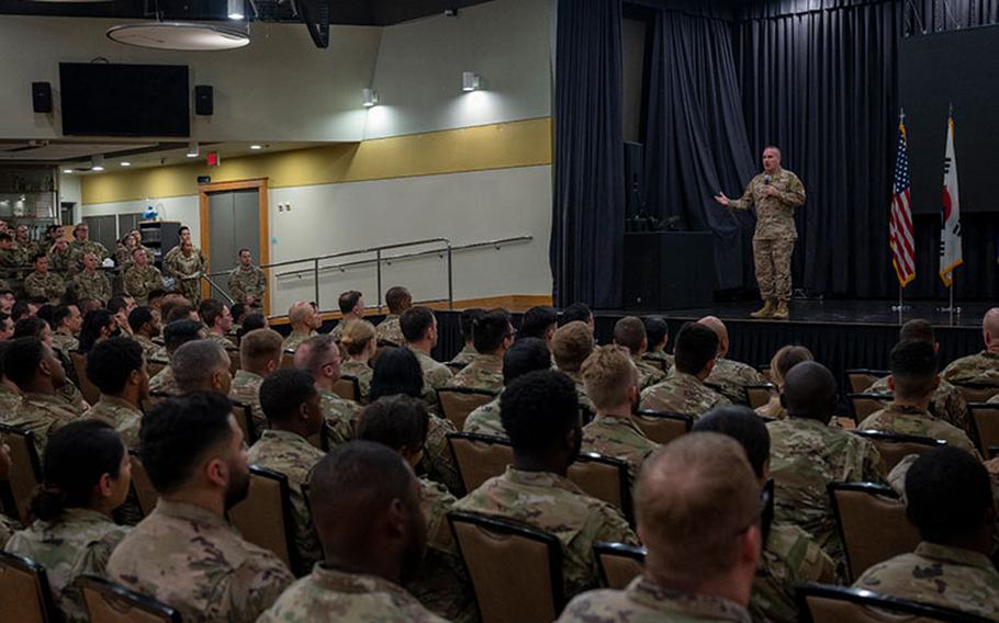 U.S. Air Force Chief Master Sgt. David Wolfe, Pacific Air Forces (PACAF) command chief, speaks during an all-call at Osan Air Base, Republic of Korea, June 15, 2023. Wolfe oversees approximately 48,000 personnel within PACAF and advises Gen. Ken Wilsbach, PACAF commander, on matters involving Airmen readiness, training, professional development and effective utilization of manning and resources within the pacific theater. (U.S. Air Force photo by Senior Airman Aaron Edwards)