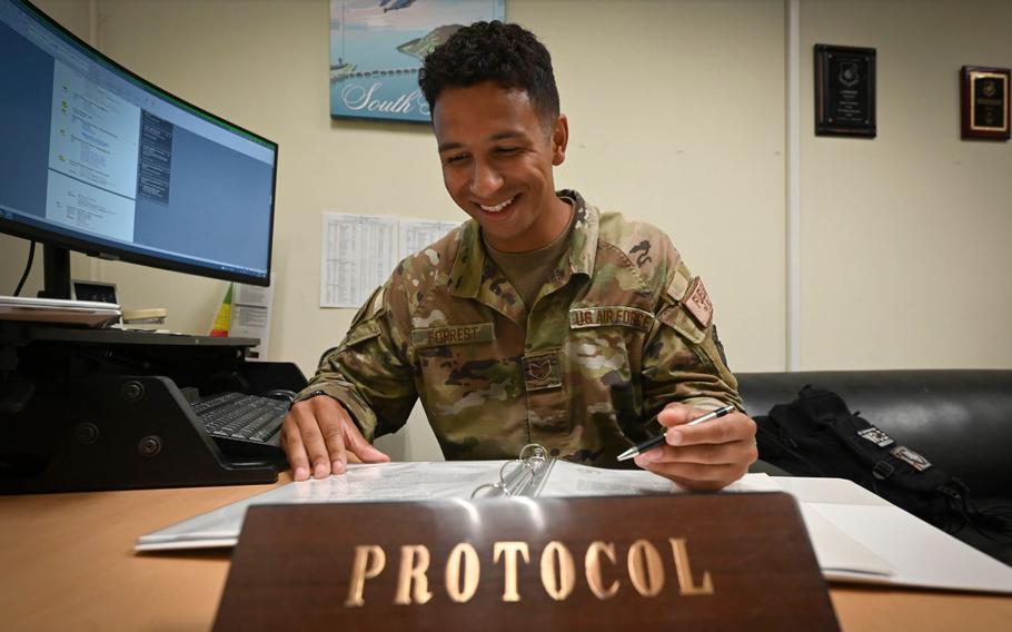 U.S. Air Force Staff Sgt. Bryson Forrest, 8th Fighter Wing noncommissioned officer in charge of protocol, reviews an itinerary at Kunsan Air Base, Republic of Korea, Sept. 3, 2024.