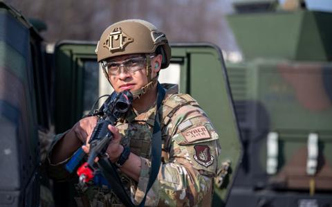 Photo Of U.S. Air Force Airman 1st Class Christian Fernandez, 51st Communications Squadron cyber systems technician, scans the area for simulated opposing forces during a Combat Readiness Course at Osan Air Base, Republic of Korea, March 14, 2024.