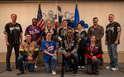 Photo Of 8th Fighter Wing annual award winners pose for a photo on Kunsan Air Base, Republic of Korea.