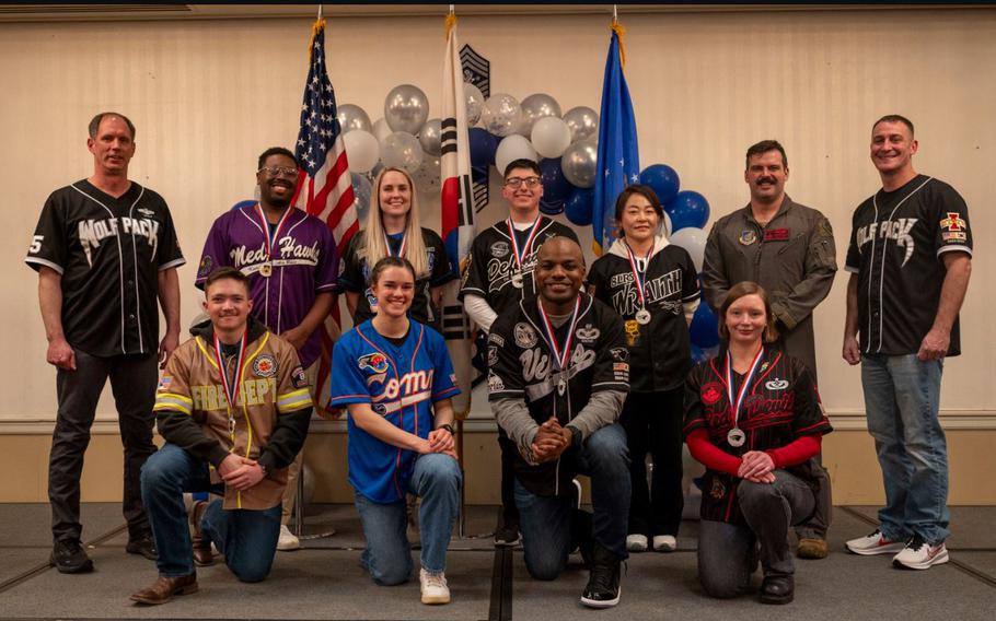 8th Fighter Wing annual award winners pose for a photo on Kunsan Air Base, Republic of Korea.