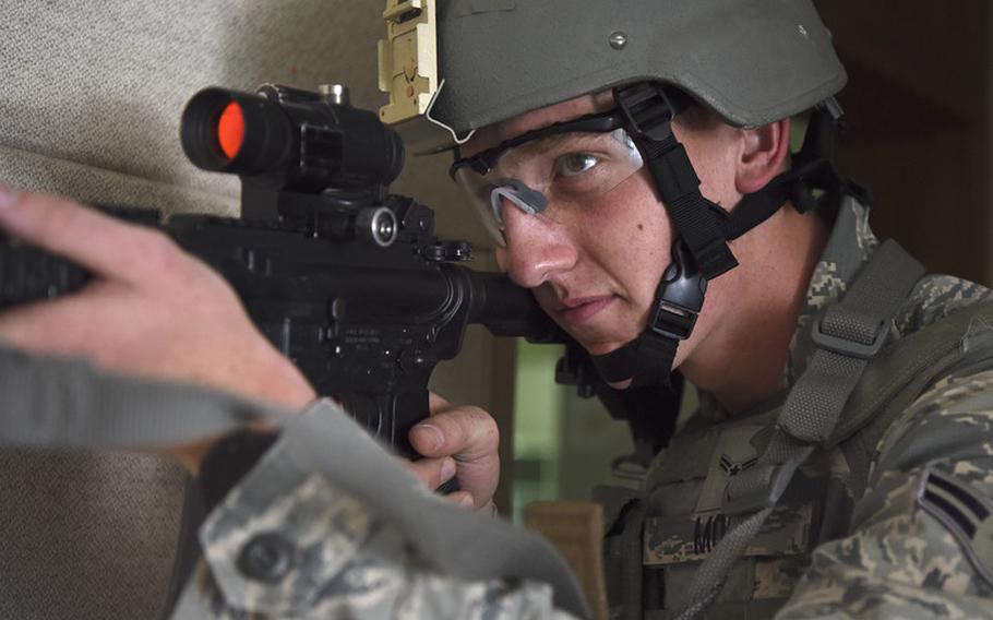 Airman 1st Class Cornelis Mol, 8th Security Forces Squadron 2019 Advanced Combat Skills Assessment team member, trains on clearing and breaching buildings at Kunsan Air Base, Republic of Korea, June 3, 2019. The five-person team trained for a month prior to traveling to Andersen Air Base, Guam, for the weeklong competition. (U.S. Air Force photo by Staff Sgt. Mackenzie Mendez)