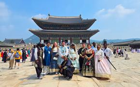 group photo in front of Gyeongbokgung Palace
