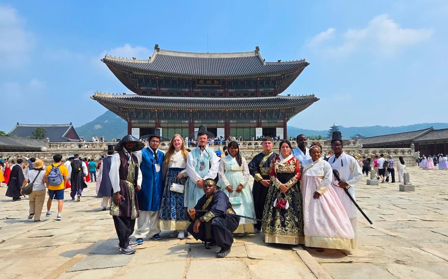 group photo in front of Gyeongbokgung Palace